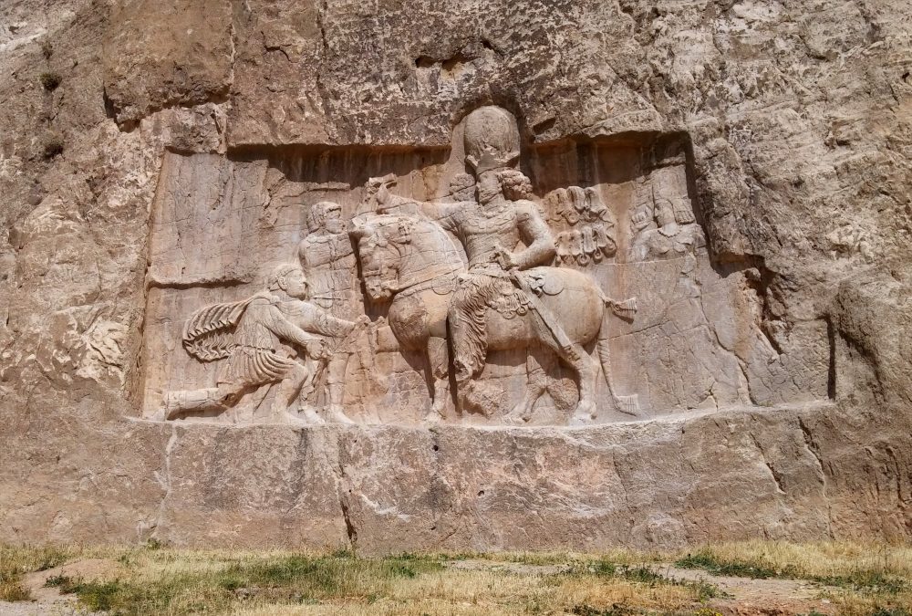 A rock face relief of Shapur I over the Roman Emperor Valerian | نقش رستم • درناتریپ ✈️